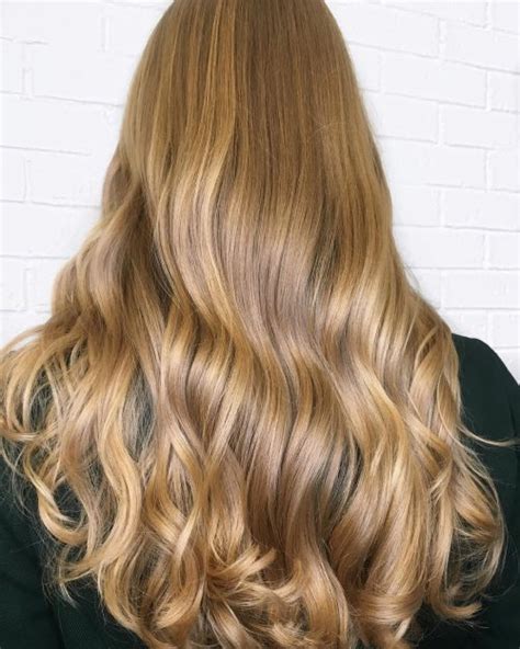Honey blonde hair is a blend of dark and warm blonde with light brown. 16 Trending Golden Blonde Hair Color Ideas for 2020