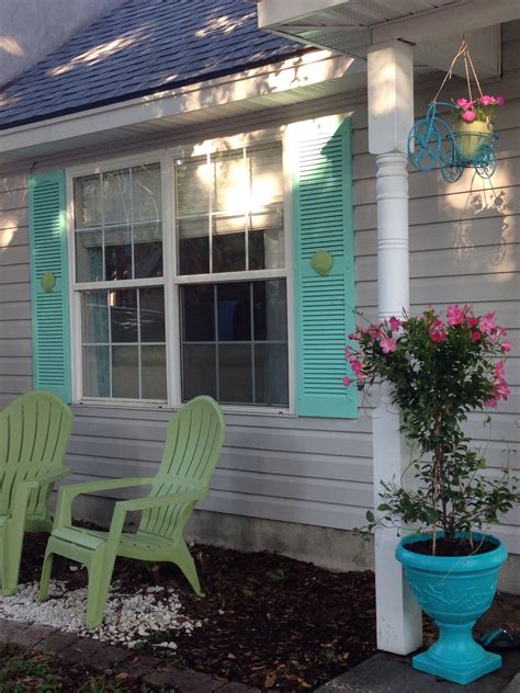 When it comes to finding the perfect version of the color, we think you cannot go wrong with turquoise tint by vaspar. Our Tybee Island home - AFTER - Updated front exterior. Turquoise Front door, turquoise garage ...