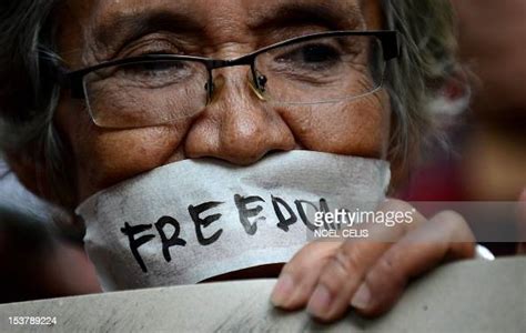 Topshot A Protester Puts Tape On Her Mouth With A Word Freedom News Photo Getty Images