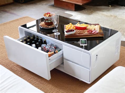 This smart coffee table with a refrigerator is called 'coosno'. Sobro - Smart Coffee Table w/ Fridge, Speakers, LED Lights ...