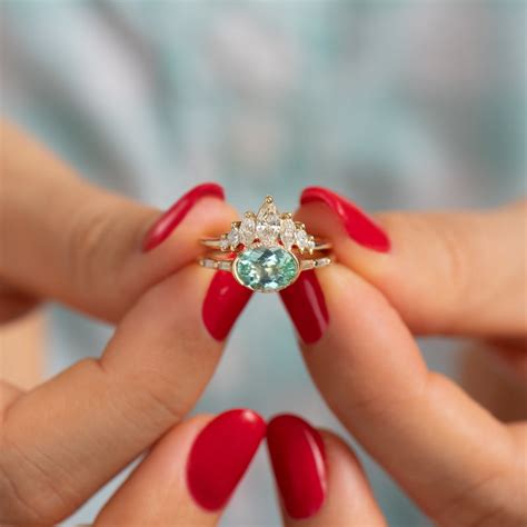 Paraiba Tourmaline Engagement Ring With Delicate Diamond Detailing O Artemer