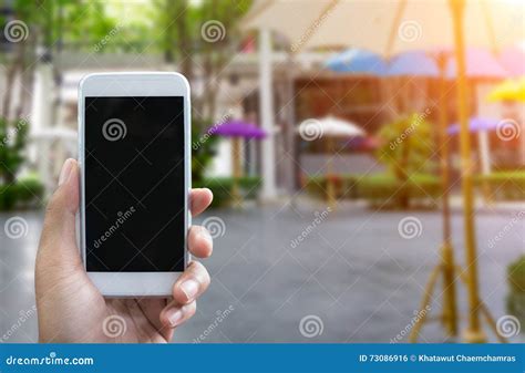 Man S Hand Shows Mobile Smartphone In Vertical Position Stock Photo