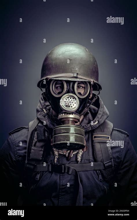 Soldier With Helmet And Gas Mask Studio Shot Stock Photo Alamy