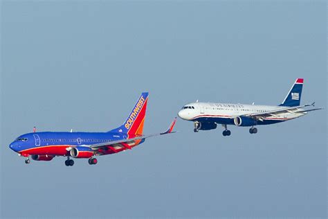 Us Airways Airbus A320 232 N679aw And Southwest Airlines B Flickr
