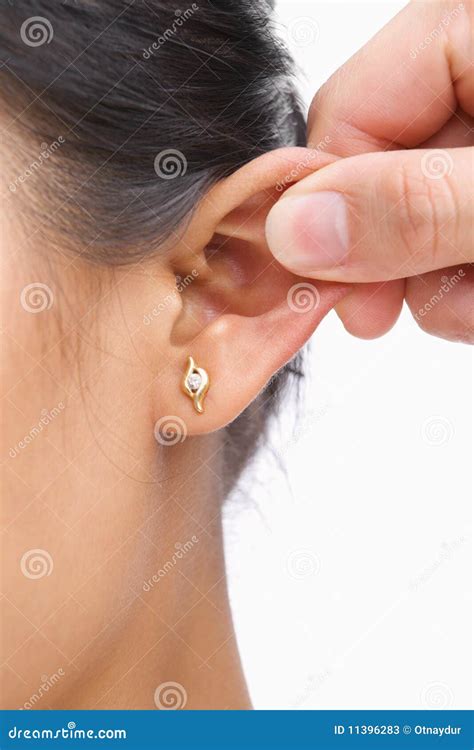 Finger Pinching Woman S Ear Stock Image Image Of Punishment Face