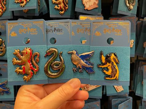 Photos New Harry Potter Hogwarts House Mascot Pins Apparate Into