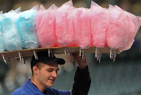 A Cotton Candy Vendor Works The Stands During The Game Between The Los