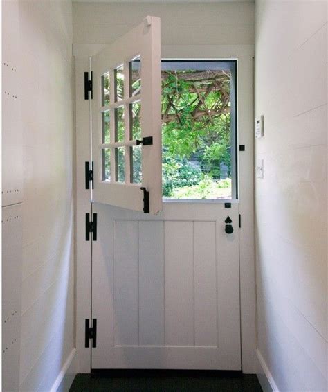 This Traditional Dutch Door With A Paned Top Half Has Four Sturdy
