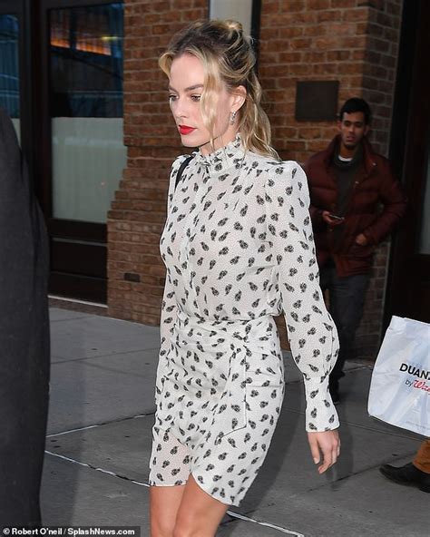Margot Robbie Reveals Her Toned Legs In Chic Patterned Mini Dress