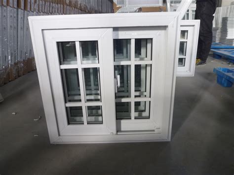 Sliding Upvc Window With Grids The Home Expo
