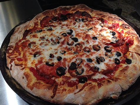 Perfect Pepperoni Pizza With Black Olives A Food Lovers Delight