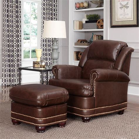 Check out a storage ottoman. Home Styles Beau Brown Faux Leather Arm Chair with Ottoman ...