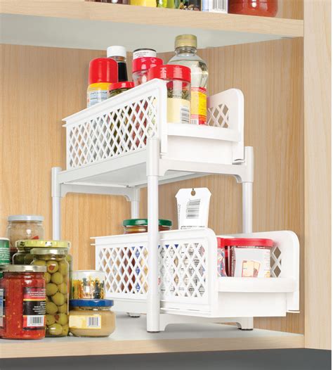 I purchased two sets, one for my master bathroom the other for my kitchen. Pull Out Cabinet Baskets in Cabinet Shelves