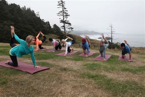 overlooking the foggy morning coast of ecola state park the couples enjoyed a morning yoga