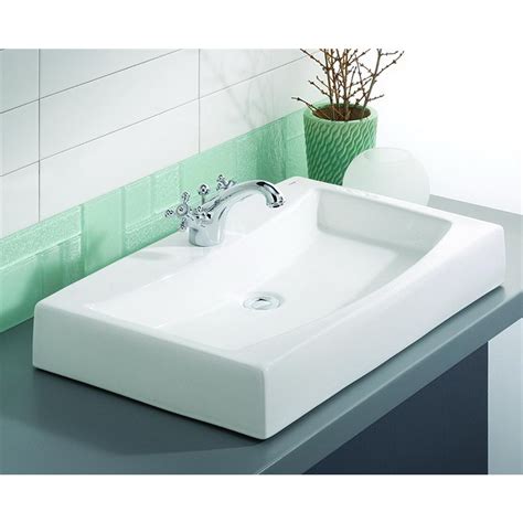 Above counter bathroom sinks sit on top of bathroom counters and feature outlets at the bottom for drainage. Shop Cheviot Mediterranean White Above Counter Rectangular ...
