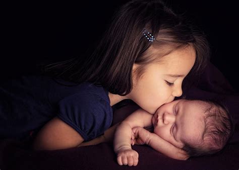 Little Girl Kissing Her Baby Brother Hd Wallpaper Background Image
