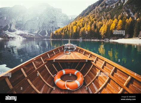 Beautiful View Of Traditional Wooden Rowing Boat On Scenic Lago Di