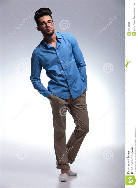 Casual Man Poses With Hands In Pockets Stock Photo - Image of model