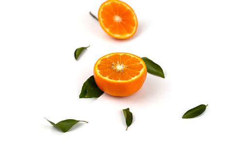 Photo Libre De Droit De Un Fruit Orange Des Tranches Dorange Et Des
