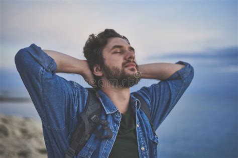 Peaceful Guy Breathing Fresh Air At The Seaside Stock Photo Image Of