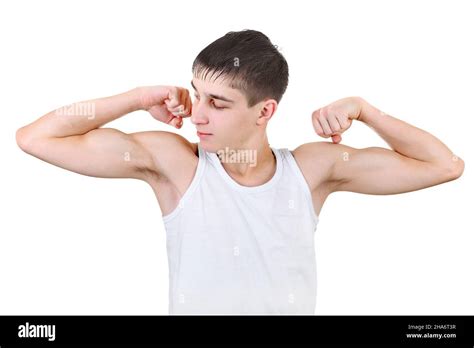 Handsome Teenager Muscle Flexing Isolated On The White Background Stock