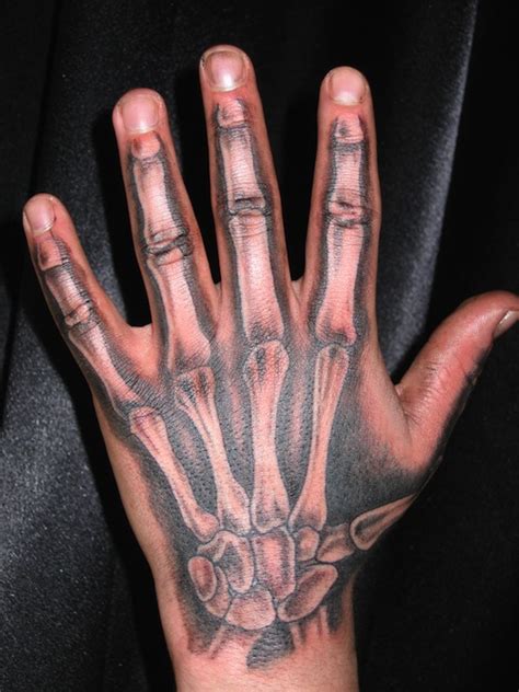 45 Best Skeleton Hand Tattoo And Designs