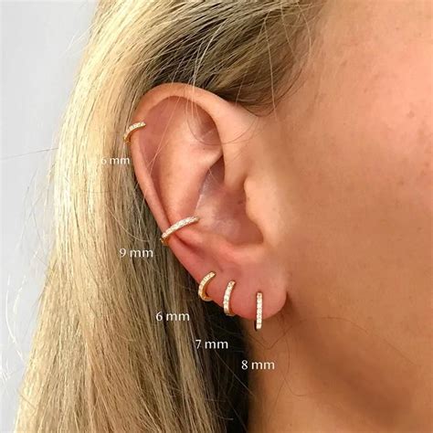 Whether You Have Two Five Or Ten Ear Piercings Intersperse Them With