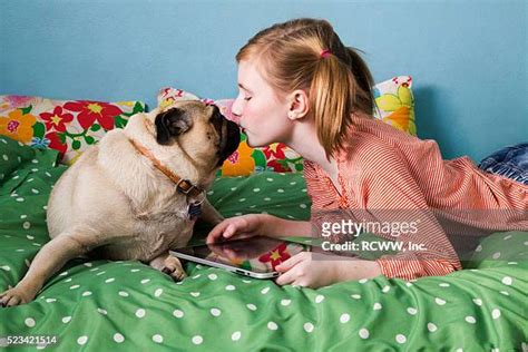 Girl Kissing Dog Photos And Premium High Res Pictures Getty Images