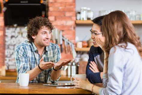Friends Meeting In Cafe And Drinking Coffee Stock Photo Image Of