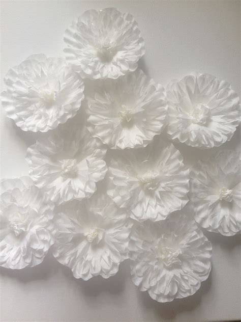 Flowers feature the delicacy and softness and to attain it while working on the diy paper flowers you should opt for the crepe paper to bring the more realistic beauty int he flowers and here a gorgeous example and sample of flowers has been shown. Pancakes & Glue Guns: DIY Paper Flower Wall Take 2: Part 2 ...