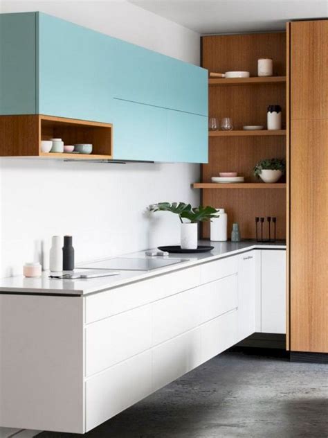 Minimalist kitchen with a modernist dining set. 14 Minimalist Kitchen Cabinet Design model In 2019