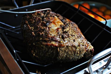 A prime rib recipe with a mustard and peppercorn coating to serve for a holiday or christmas dinner. Simply Scratch Dijon-Rosemary Crusted Prime Rib Roast with ...