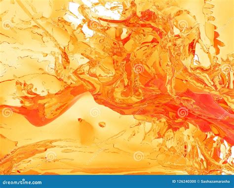 Yellow Orange Liquid Splash Isolated On White Background Stock
