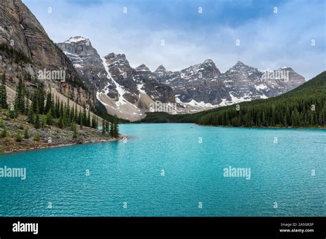 Beautiful Turquoise Water Of Moraine Lake In Foggy Moning Rocky