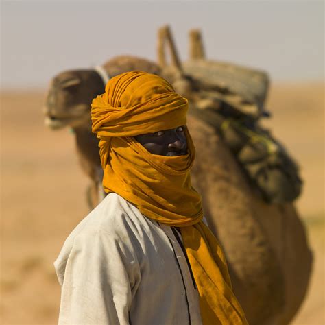 Tuareg And His Camel In The Desert Libya Tuareg People A Flickr