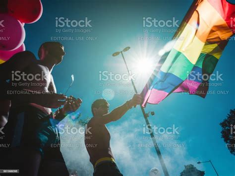 Gay Pride Men Dancing Lgbt People On Truck With Rainbow Flag Stock