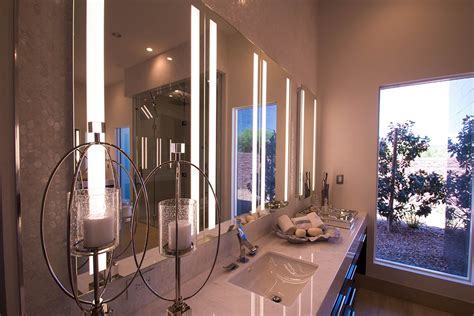 Mirror cabinets double as storage and larger mirrors will make your bathroom look brighter and bigger. Custom Glass For A Sunwest Custom Home Build - A Cutting ...