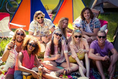 Group Of Friends Having Fun Together At Campsite Stock Image Image Of Carefree Drink 87856037
