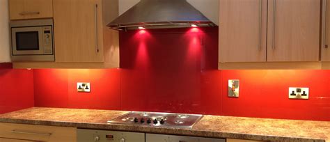 Using dark grout in your kitchen splashback can help hide hard to clean stains and provide a chic contrast against white tiles. Ruby red coloured toughened glass splashback. | Coloured ...