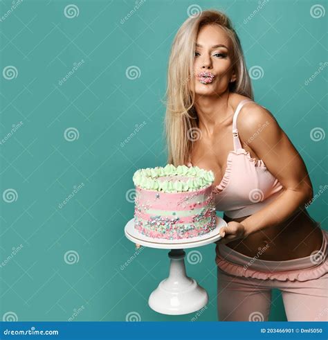 Beautiful Fitness Woman In Bra And Pants Holding Birthday Holiday Cake With Cream And Showing
