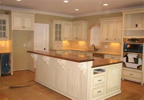Fresh White Kitchen Cabinets With Brown Quartz Countertops The Awesome And Interesting White