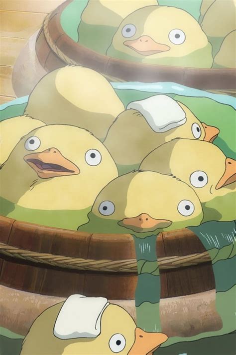 A Bunch Of Yellow Ducks Sitting In A Basket