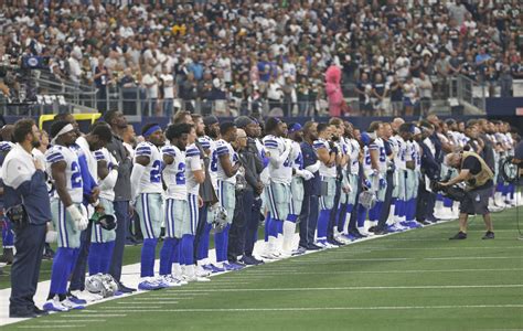 Dallas Cowboys Players Ponder Kneeling During National Anthem The