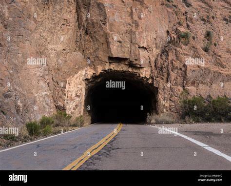 Rugged Tunnel Through Mountain Stock Photo Alamy