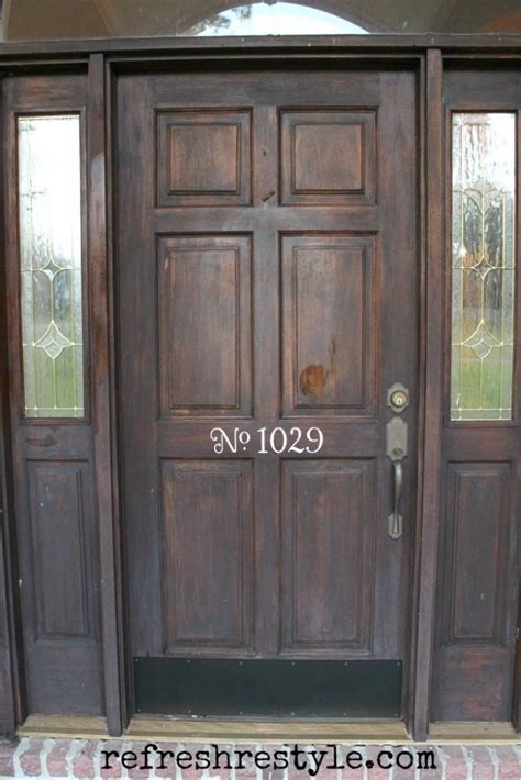Often the front door is painted an accent color to draw attention to the entrance. How to Stain Your Front Door | Refresh Restyle