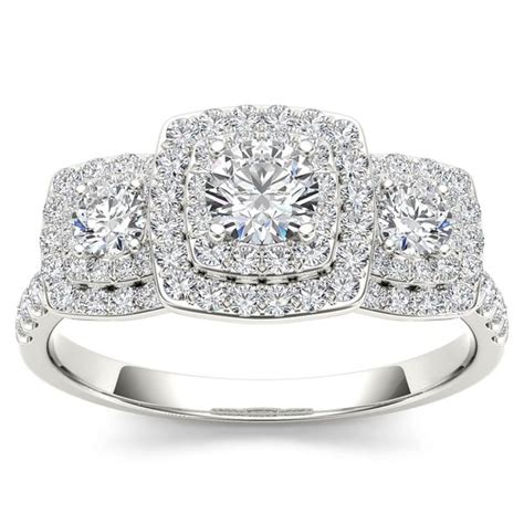 Accented with two 3.00 x 3.00mm round diamonds and diamond on halos. De Couer 10k White Gold 1ct TDW Diamond Halo 3-stone Engagement Ring (H-I, I2) - Free Shipping ...