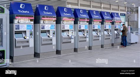 Row Of 7 Card And Cash Payment Train Ticket Machines At London Bridge