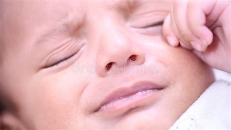 Newborn Baby Boy Crying Over The Shoulder Of His Father Stock Image