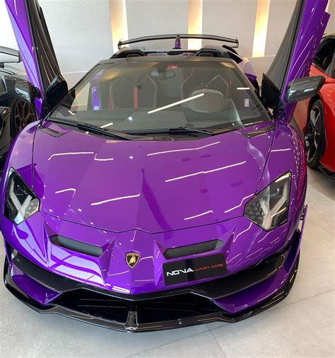Purple Lamborghini Aventador Svj Roadster In A Showroom In Dubai