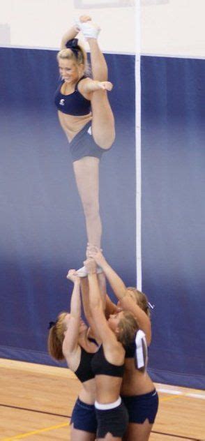 bow and arrow wow cheer stunts dance team pictures cheerleading dance
